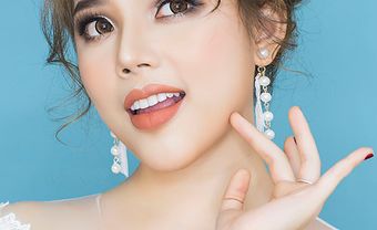 Trang điểm cô dâu rạng rỡ với son cam mới mẻ - Blog Marry